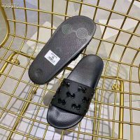 gucci_men_s_rubber_gg_slide_sandal-black_1_