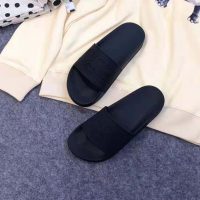 gucci_unisex_gucci_logo_rubber_slide_sandal-black_1_