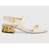 Gucci GG Women Sandal with Chain-Shaped Heel Butter Colored Leather with Off-White