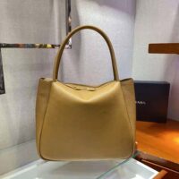 Prada Women Medium Leather handbag with the Prada Metal Lettering Logo Illuminating Its Center-brown (1)