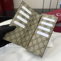Gucci Unisex GG Emblem Bi Fold Embossed Card Case-Brown 818953AAEQ72747